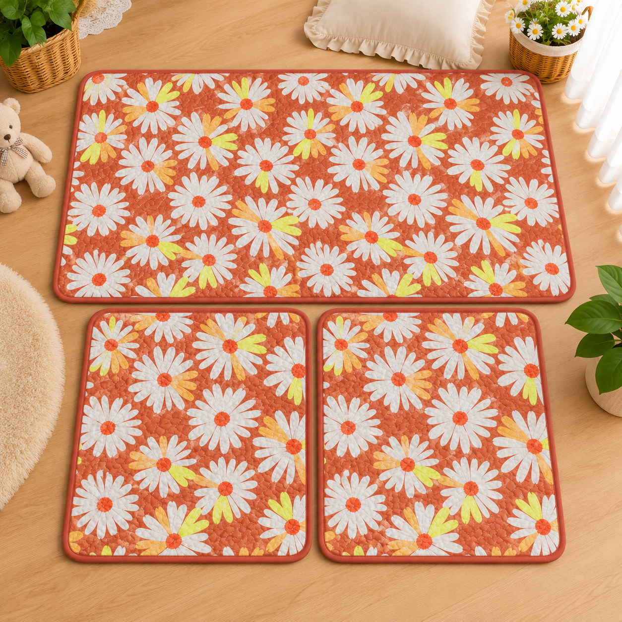 Orange and white daisy-print floor mat set.