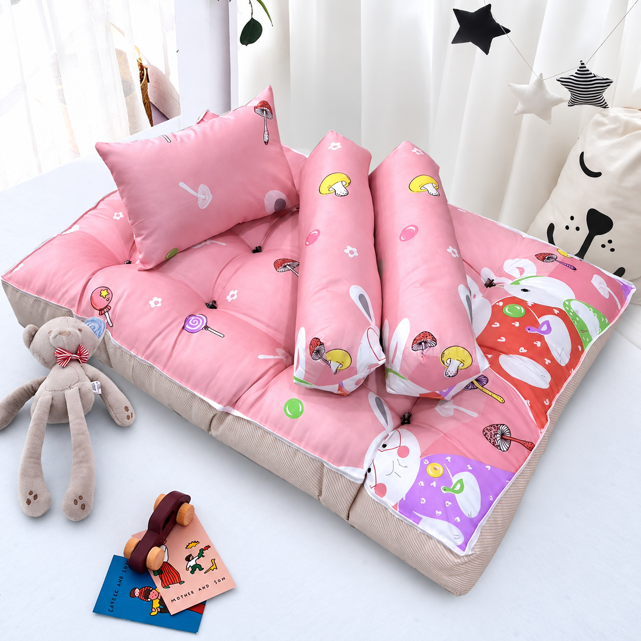 Pink floral and bunny toddler nap mat set with matching pillow and bolsters.